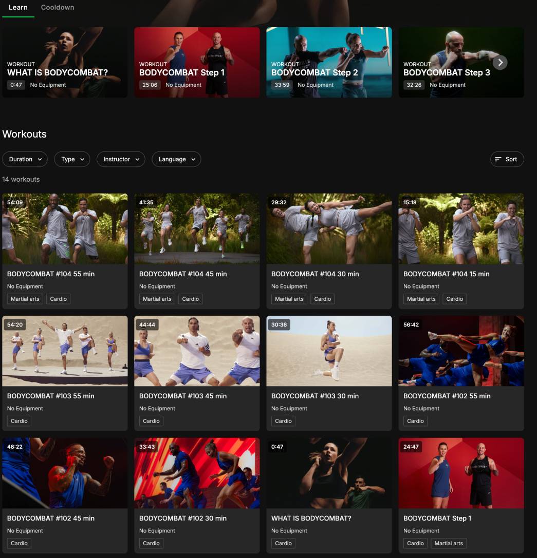 Les Mills+ BodyCombat workout class on streaming platform showing high-energy cardio for women